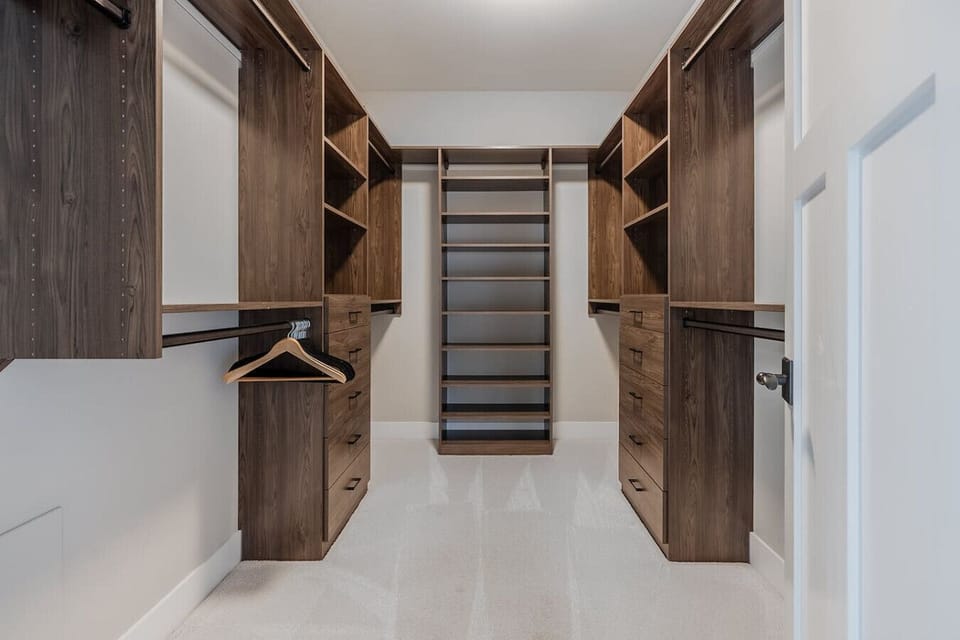 Plenty of room for your wardrobe in the primary bedroom walk-in closet