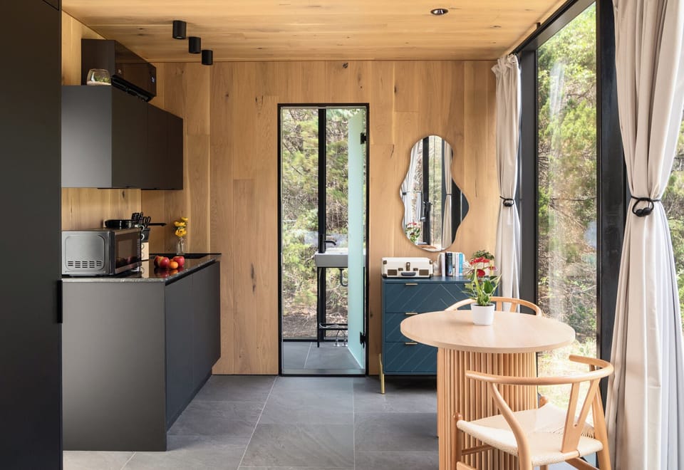 Kitchenette with Electric Stove, Microwave, Pots, Pans, Utensils, Coffee Maker, and More