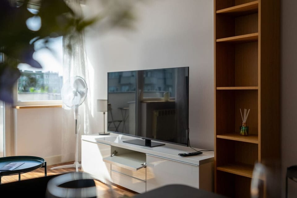 Living Room with Sofa Bed, Smart TV and Dining Table | Book Now with RENTUJEMY.COM