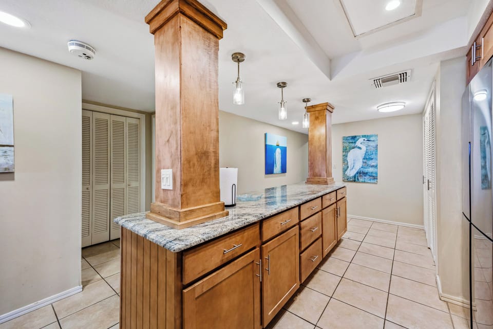 The kitchen has ample storage.