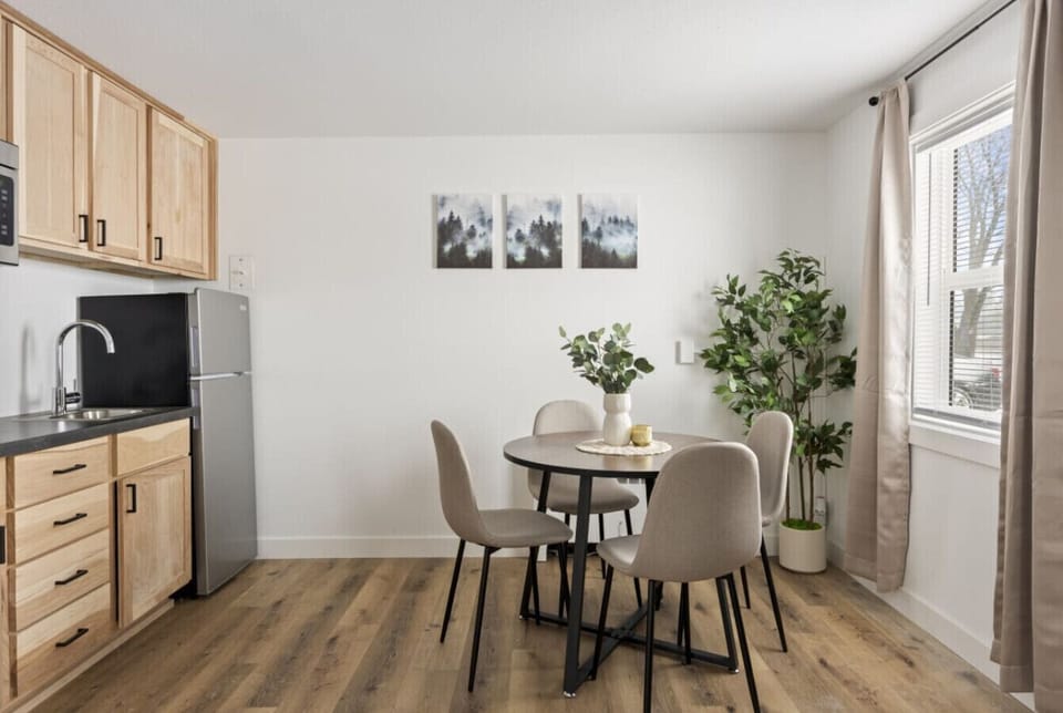 Comfortable dining area with a practical kitchenette.