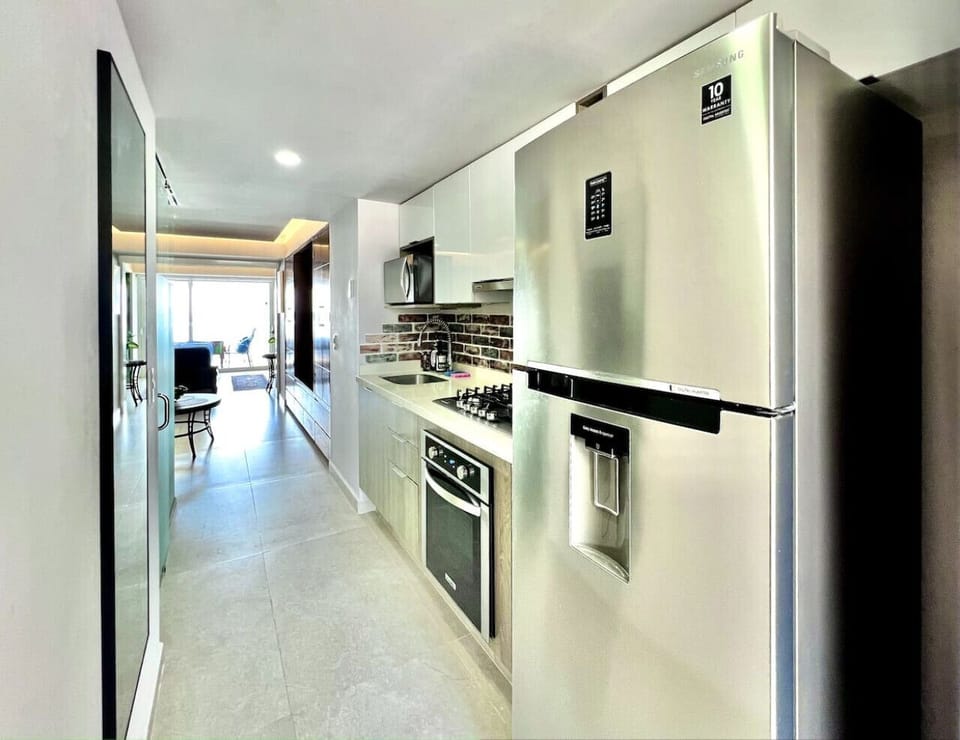 Welcoming entry into kitchen and out to the sea