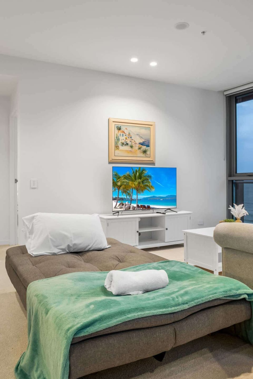 The sofa bed folds out easily to sleep an extra guest—we provide all spare linens.