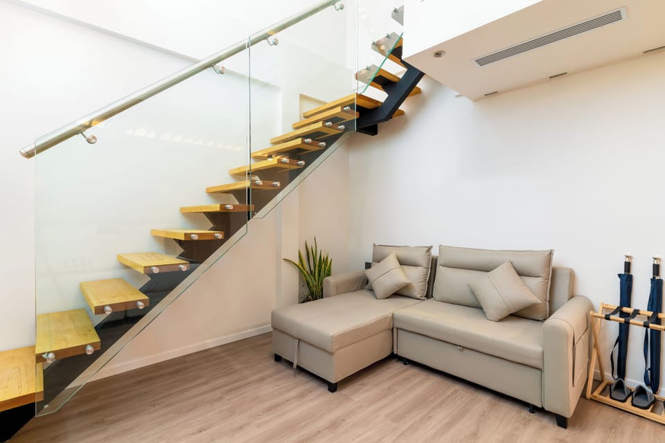 Duplex Apartment with Beach View | Living room | 40-inch Smart TV with digital channels, Netflix, toys