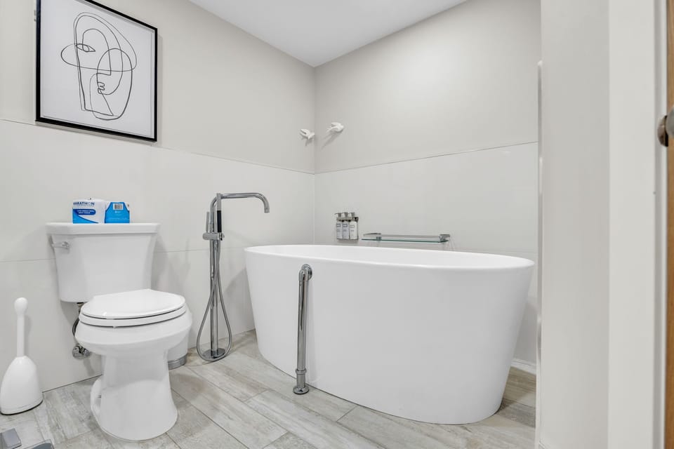 Bathroom 2: En-suite bathroom, upper floor, freestanding tub, large glass shower
