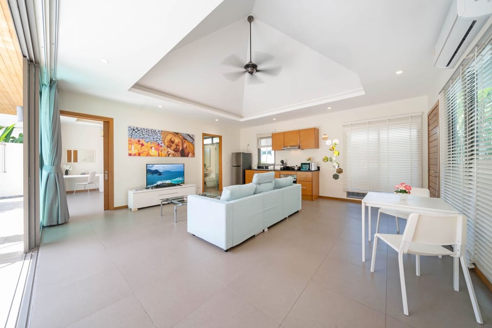 Exclusive Villa, 2 Bedrooms, Pool View | Living area | 46-inch flat-screen TV with cable channels
