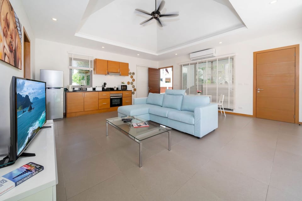 Exclusive Villa, 2 Bedrooms, Pool View | Living room | 46-inch flat-screen TV with cable channels