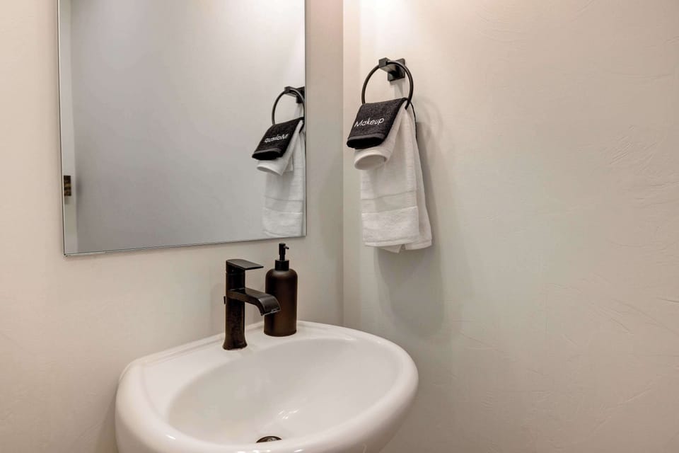 Half Bathroom 1: Includes a sink and a toilet 