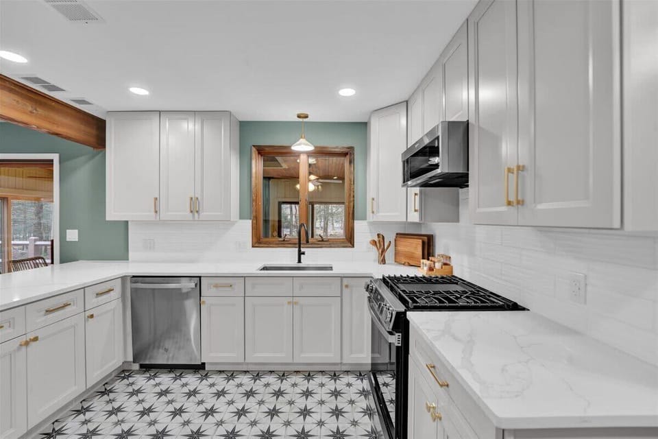 Spacious Kitchen with Full-Size Fridge and Storage
