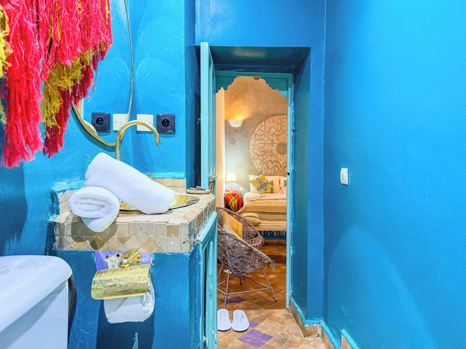 Deluxe Double Room | Bathroom | Designer toiletries, hair dryer, towels, soap