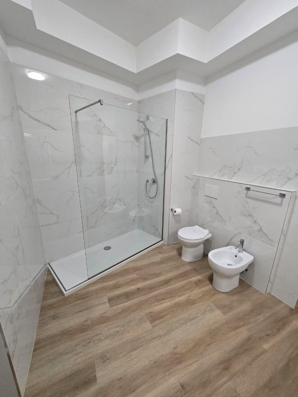 Deluxe Townhome | Bathroom | Hair dryer, towels, soap, shampoo