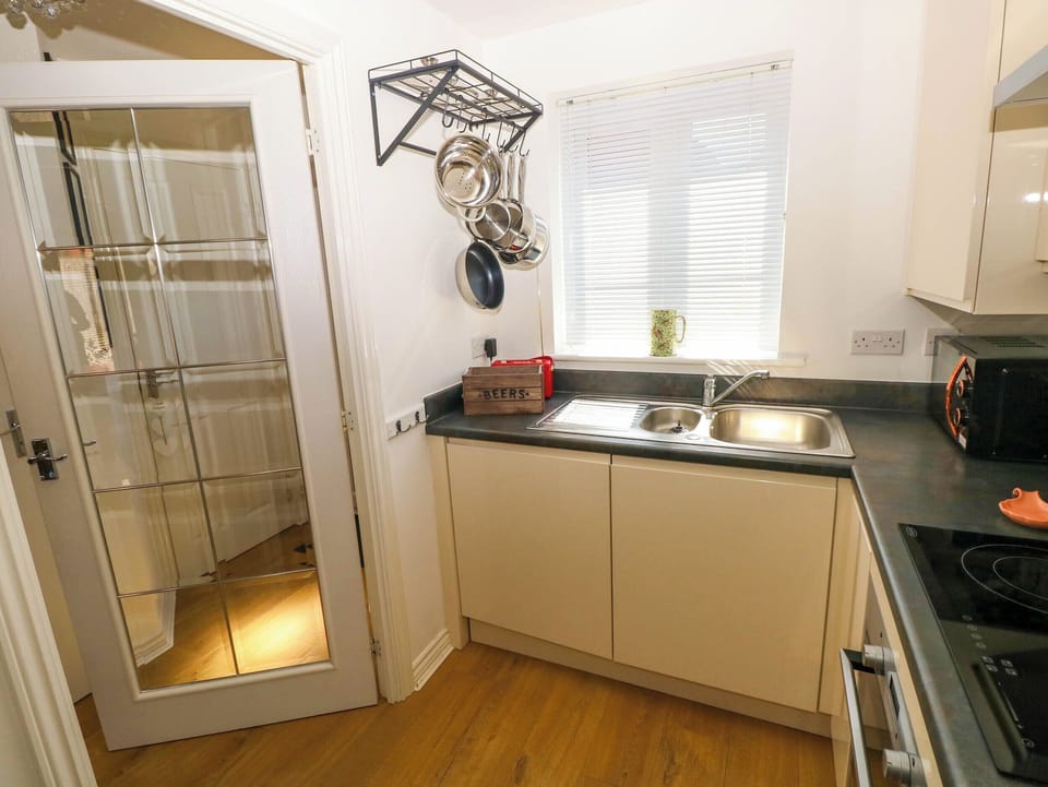 Fridge, microwave, toaster, cookware/dishes/utensils
