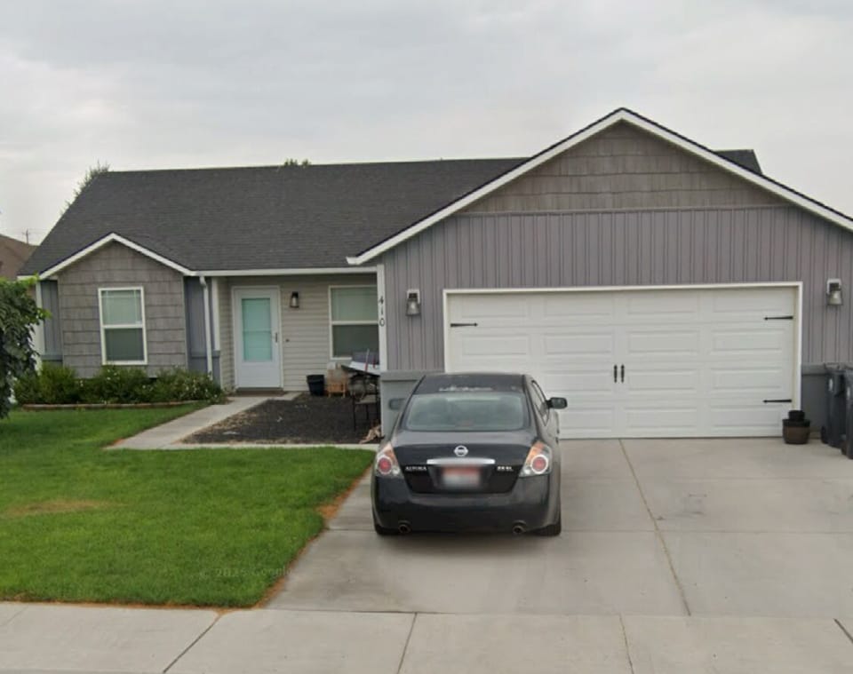 Front exterior and driveway parking 