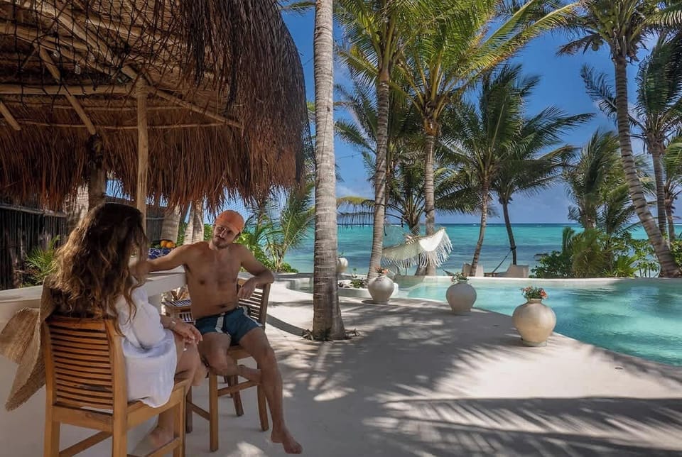 Relax in your private pool while admiring breathtaking beach views.