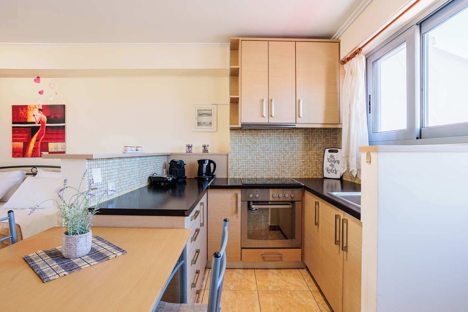 Fully-Equipped Kitchen with Modern Appliances and Ample Storage

