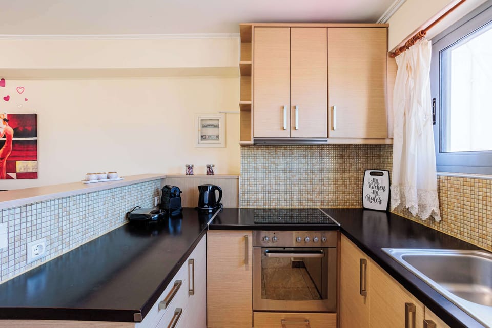 Contemporary Kitchen Zone with Granite Counters and Full Amenities

