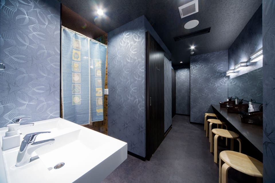 Shower, slippers, bidet, towels