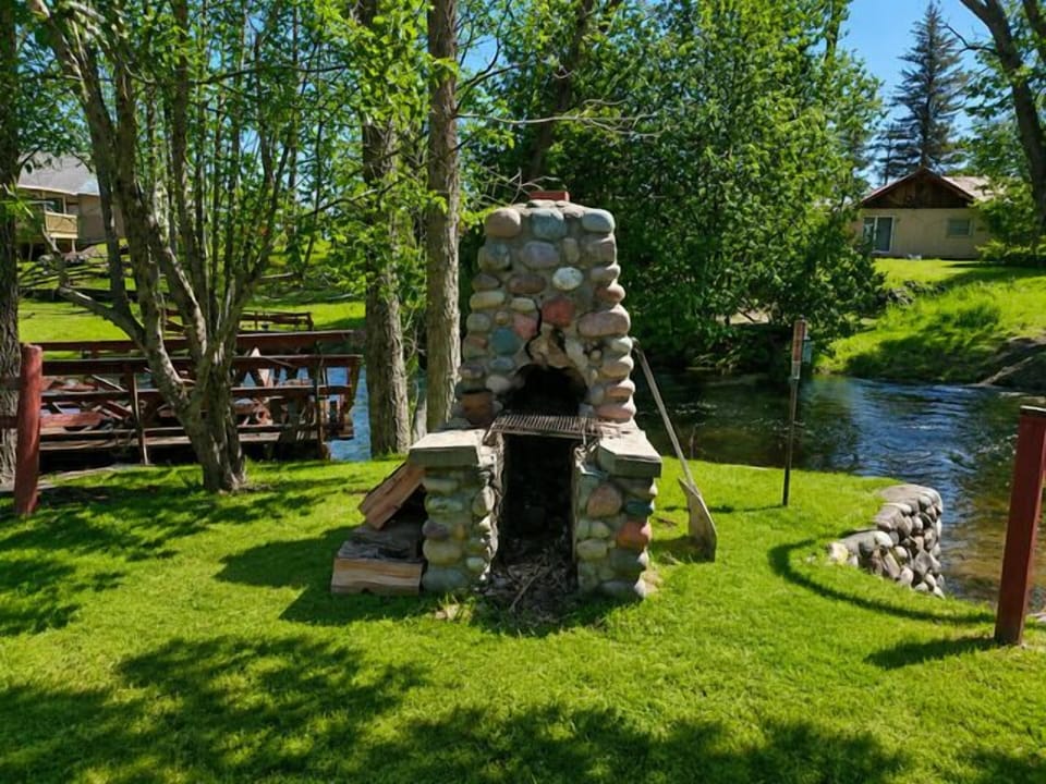 old time outdoor fireplace and grill