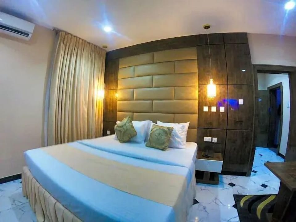 Family Room, Balcony, City View | Desk, laptop workspace, blackout drapes, soundproofing