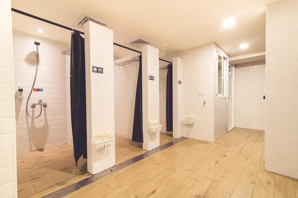 Shower, free toiletries, hair dryer, slippers