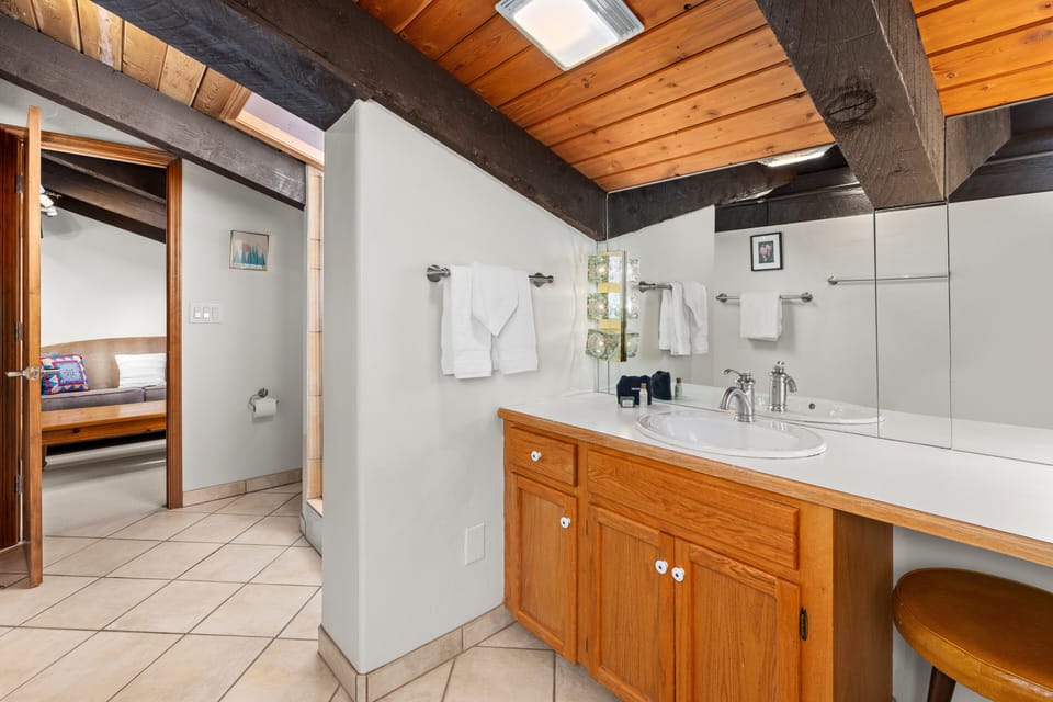 Full bathroom located on the second level of the unit.