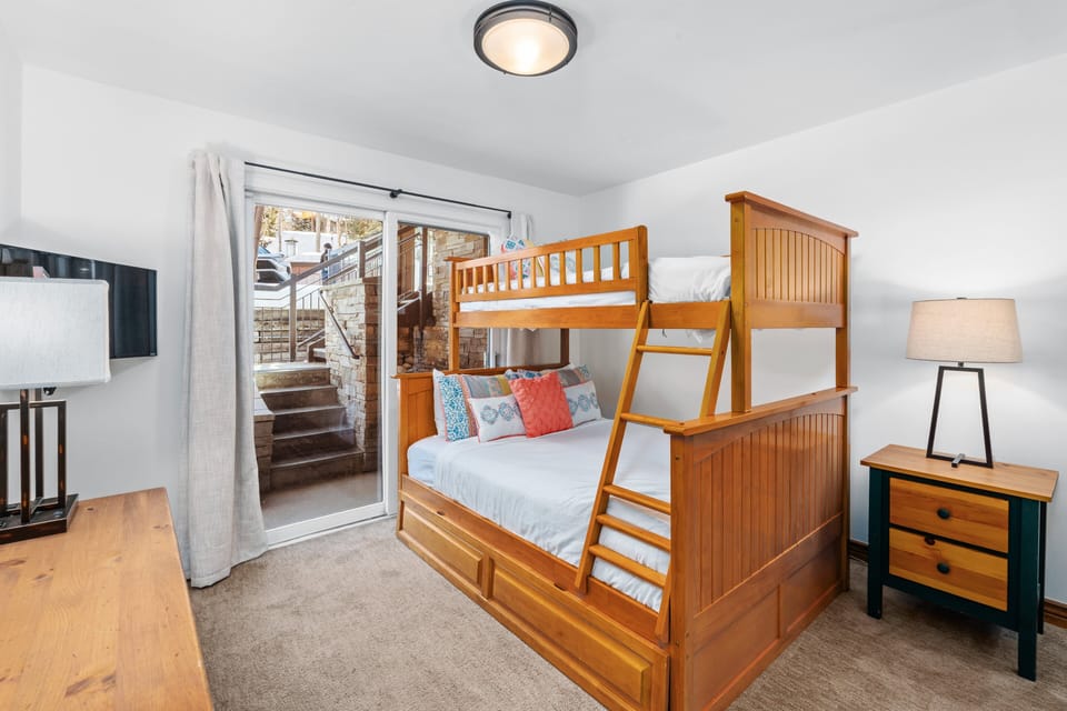 Full Bed with a Twin Bunk above