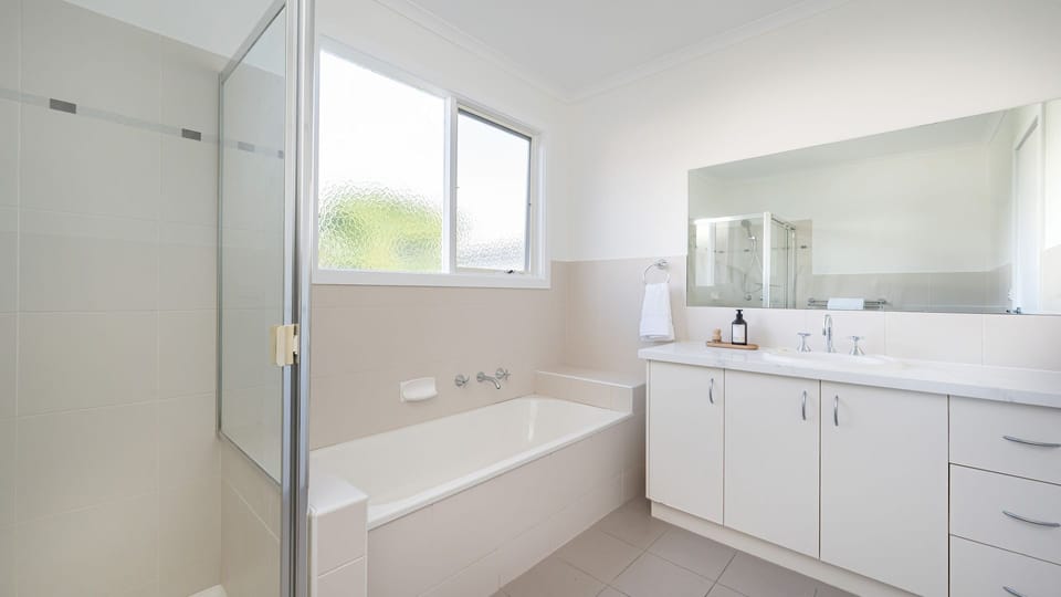 Family bathroom with bath and shower 