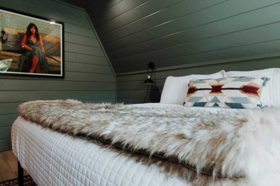At the end of the day, you'll be met with plush bedding and luxury linens..