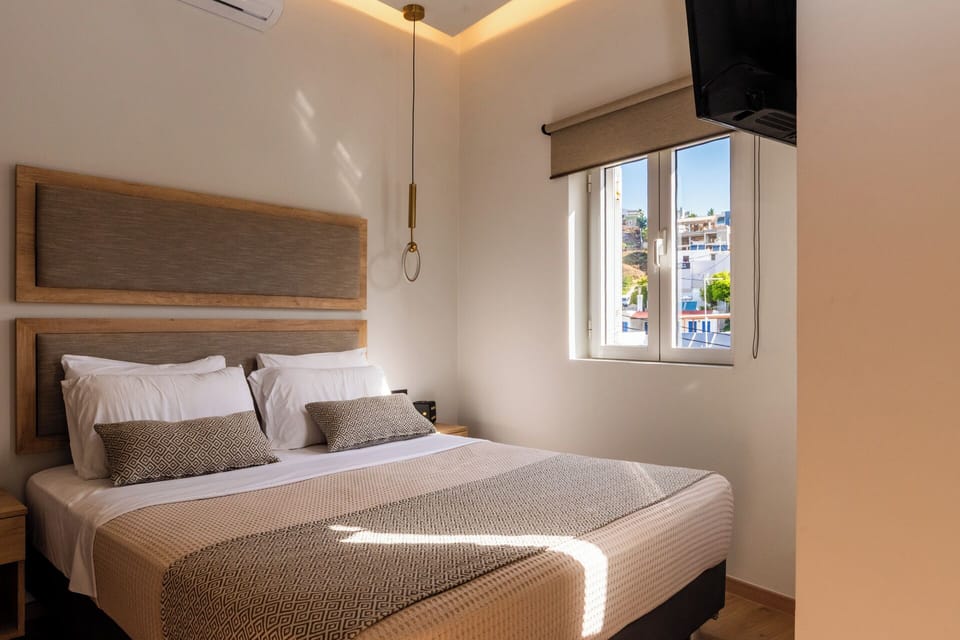 Family Quadruple Room, Balcony, Sea View | In-room safe, blackout drapes, soundproofing, iron/ironing board