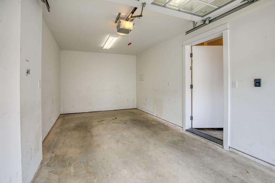 A small car garage is available for parking. 