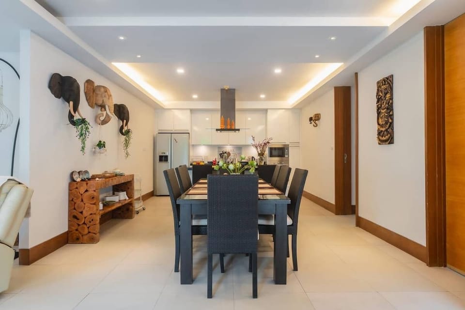 Dining area with large table and stylish interior decor