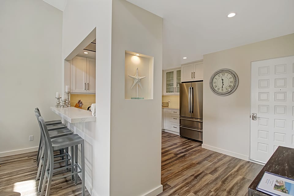 Kitchen and entry area shows how wonderful the design and layout are.