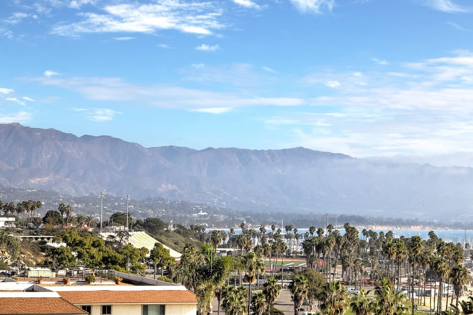 Enjoy the views of the harbor and mountains