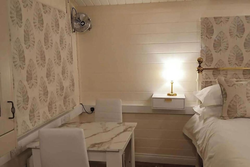  Table and two chairs which is perfect to enjoy, breakfast, lunch or evening meal or just a snack.  Just right your laptop for catching up on your emails etc. 