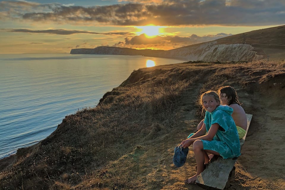 On top of the cliffs at Compton Bay, our favourite place on this earth