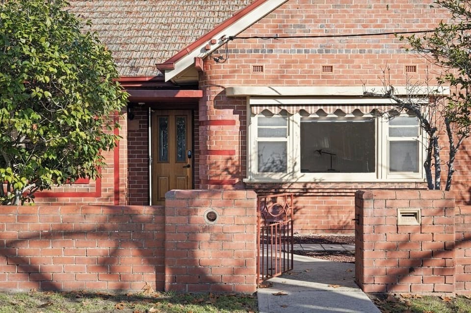 Front gate to this central art deco home