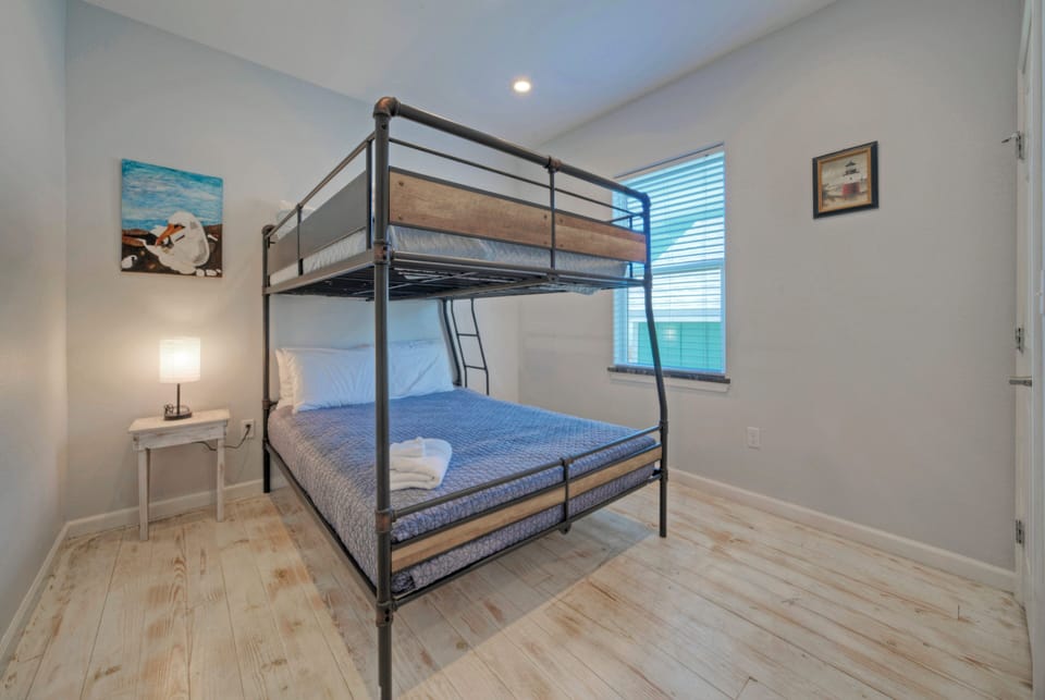 Bedroom 6 features a full over queen bunk bed. (Keeper Red)