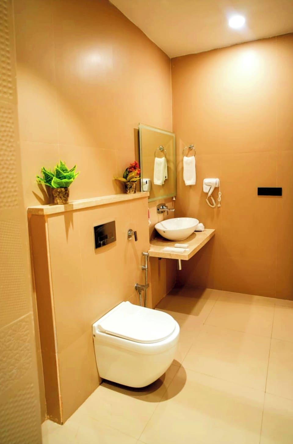 Shower, rainfall showerhead, designer toiletries, slippers