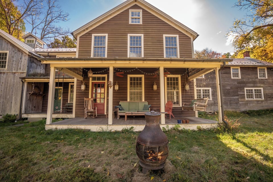 Beautiful front porch is perfect for enjoying the fall foliage