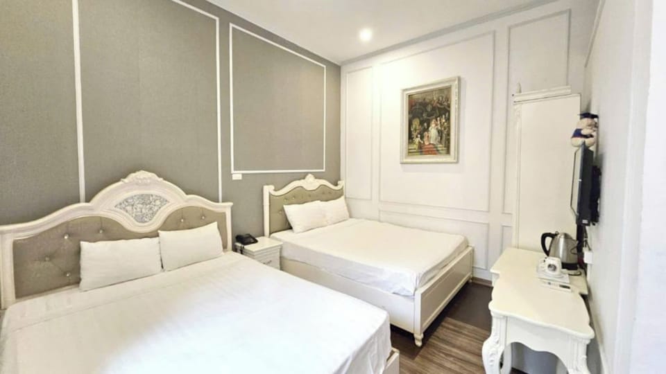 Family Quadruple Room, City View | Desk, laptop workspace, free WiFi