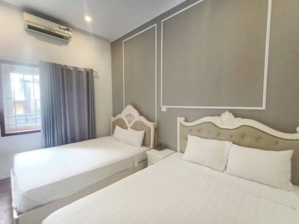 Family Quadruple Room, City View | Desk, laptop workspace, free WiFi