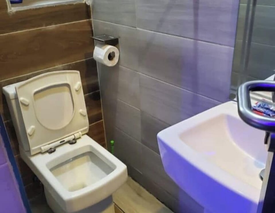 Economy Room, Balcony, City View | Bathroom | Free toiletries, hair dryer, towels, soap