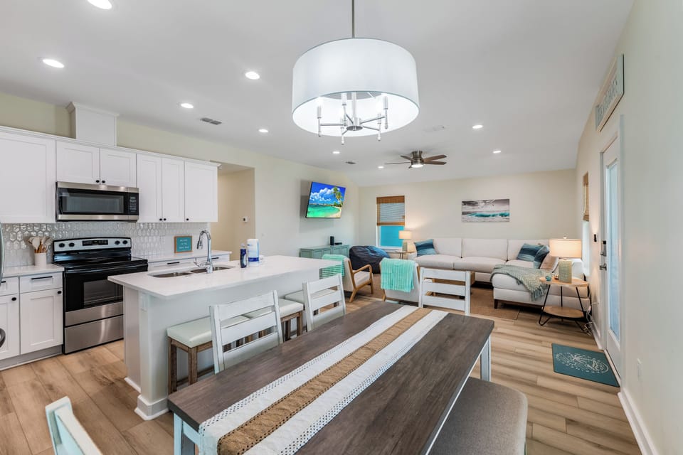 Unwind in your bright, open-concept haven with modern kitchen, cozy living space, and coastal touches throughout.