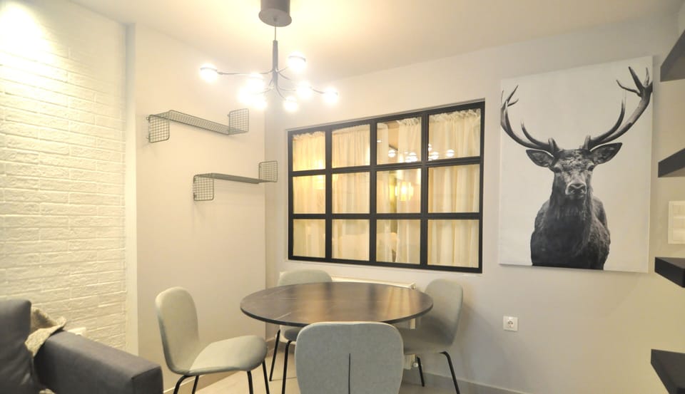 Superior Apartment, City View | Dining room