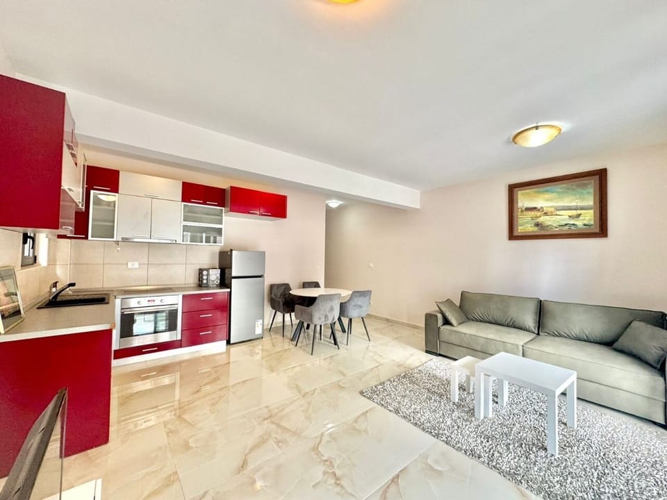 Comfort Apartment, Balcony, City View | Living area | 45-inch LCD TV with digital channels