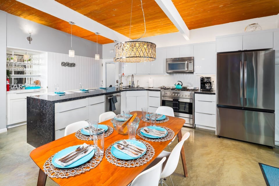 Convenient dining area right beside the kitchen, ideal for shared meals and easy serving.