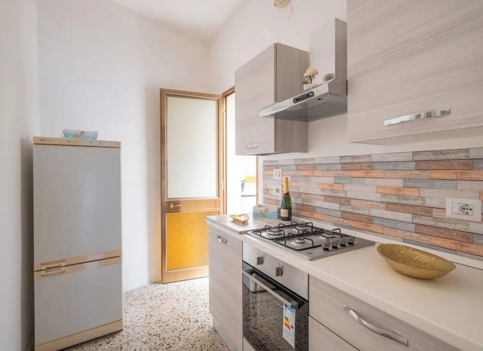 Apartment, Balcony | Private kitchen | Fridge, oven, stovetop, cookware/dishes/utensils