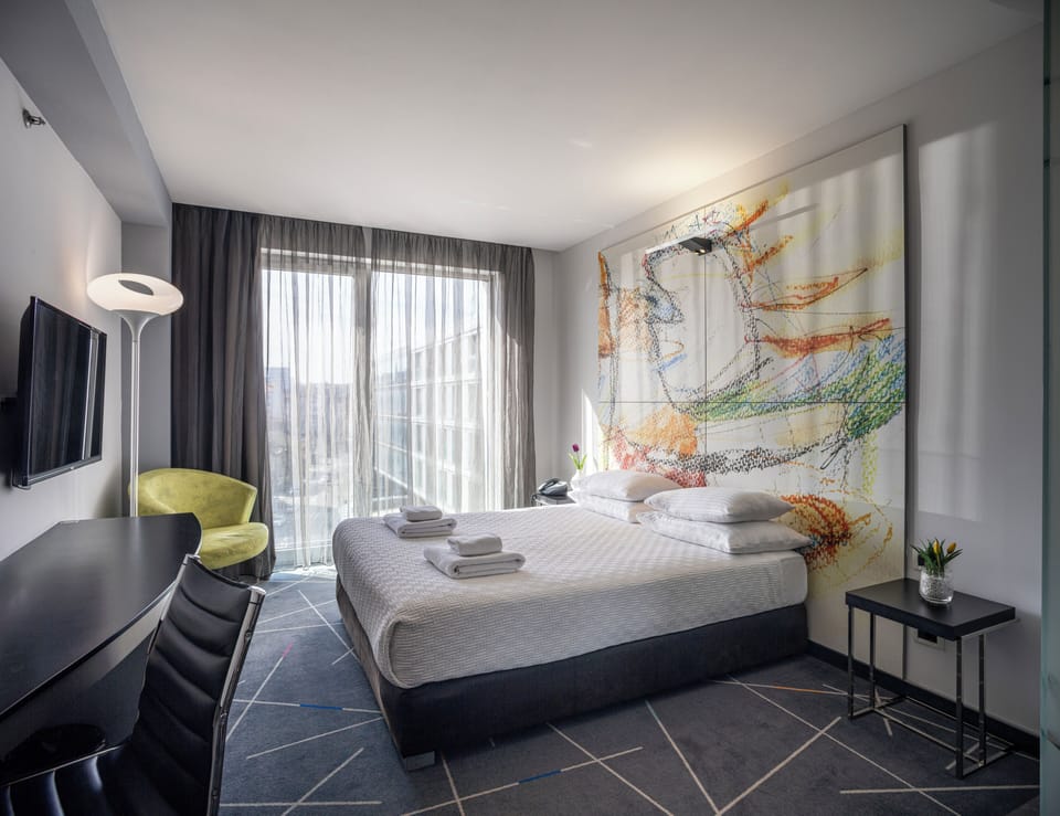 Economy Double Room | Minibar, desk, laptop workspace, soundproofing