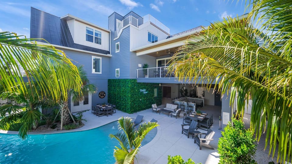 Rear Elevation - Resort Style Pool - Covered Pool Patio - Sun Shelf