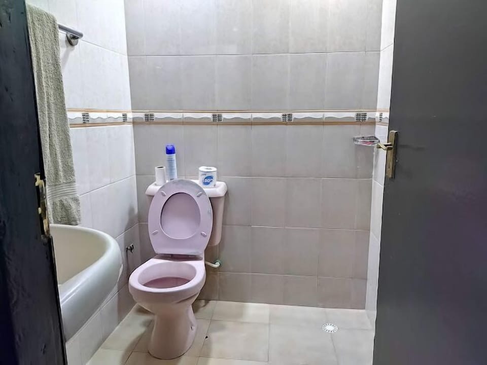 Shower, slippers, towels, soap